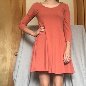 Orange Form Fitting Long Sleeve Dress